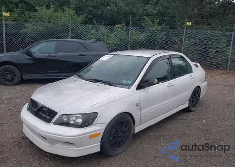 2002 Mitsubishi Lancer Oz Rally from USA, damaged, VIN JA3AJ86E42U061462